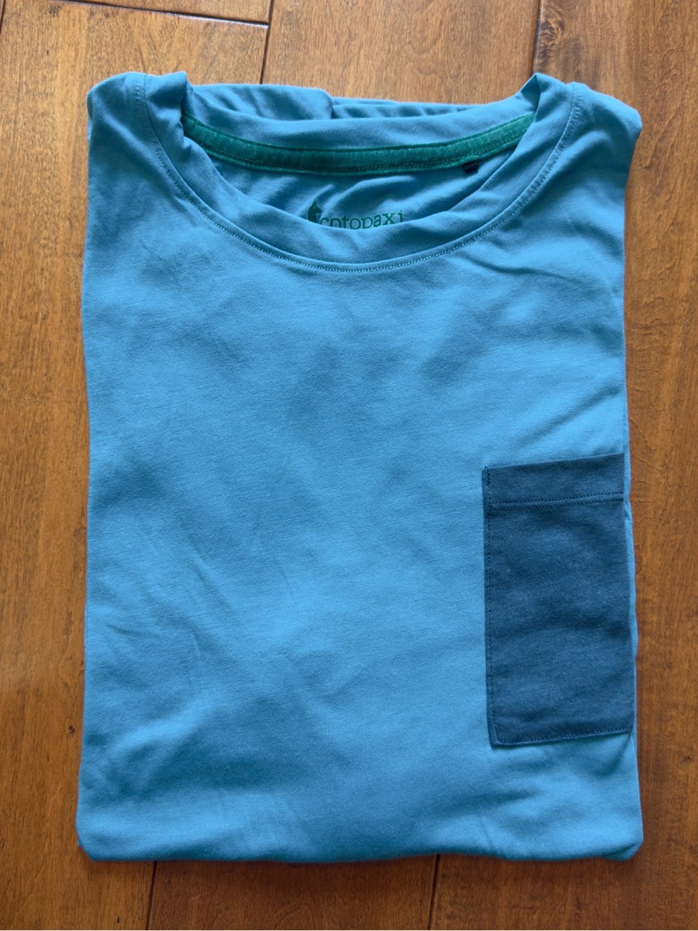 Cotopaxi teal short sleeve Paseo Travel tee with navy pocket size L - Picture 9 of 9